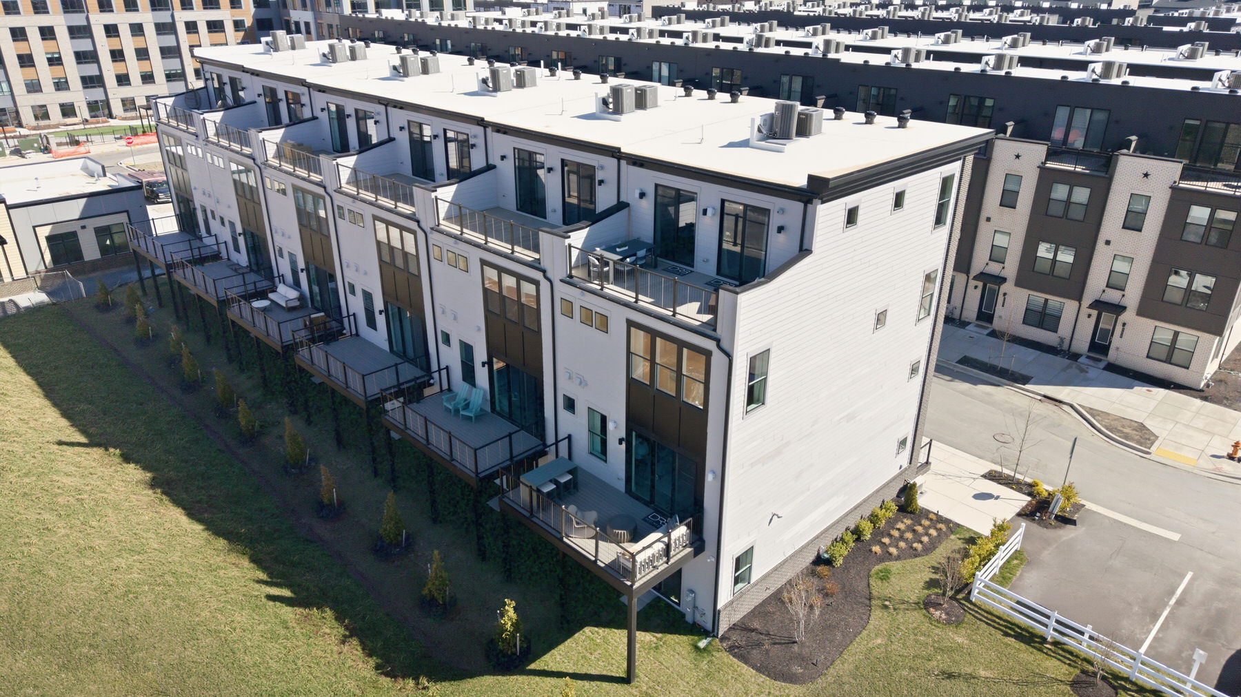 Aerial drone view of modern townhomes exterior, real estate photography Central Maryland
