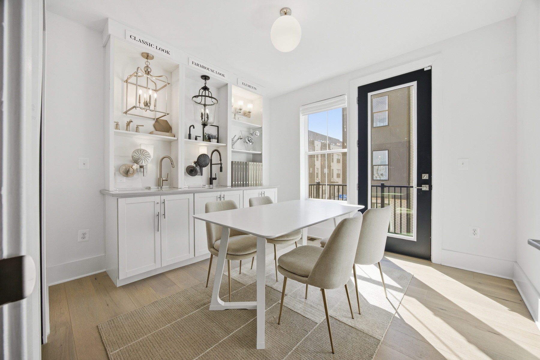 Bright dining area with white chairs and built-in display cabinetry, real estate photography Central Maryland