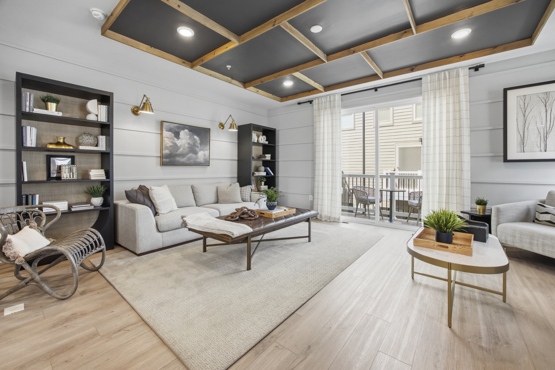Great room with dramatic coffered ceiling and shiplap walls, real estate photography Central Maryland